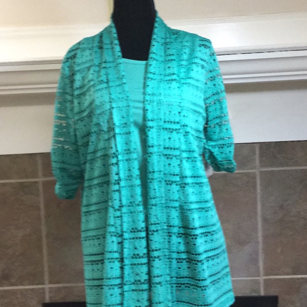 Pretty emerald green blouse. NWOT